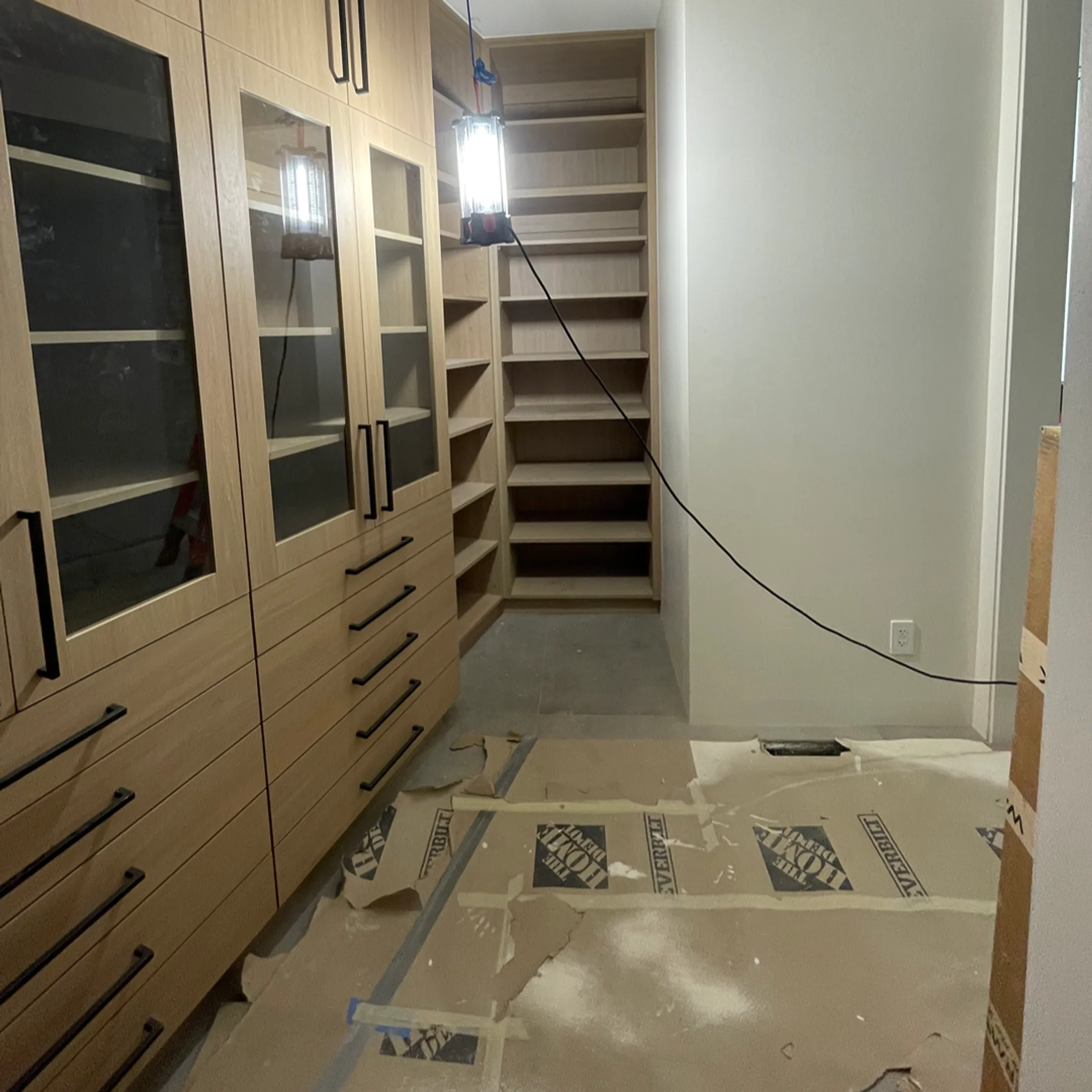 Designer reviewing custom closet plans