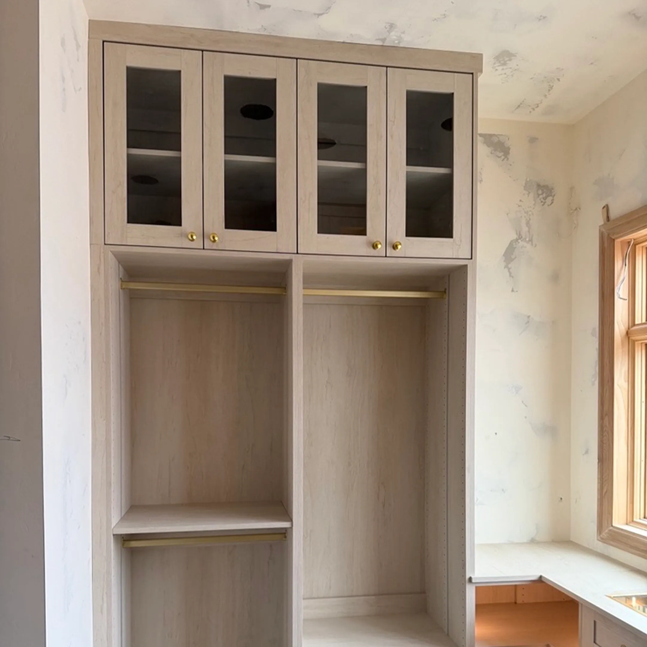 Custom closet with organized shelves and drawers