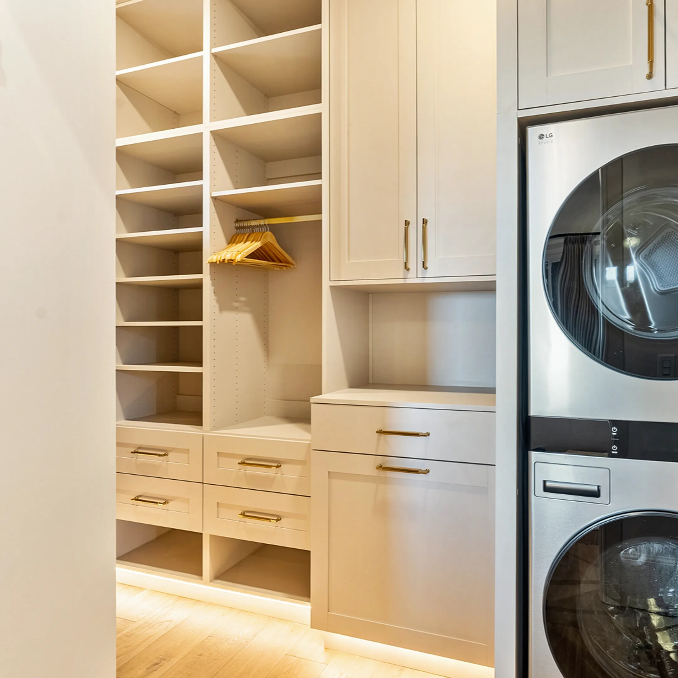 Custom closet with organized shelving and drawers