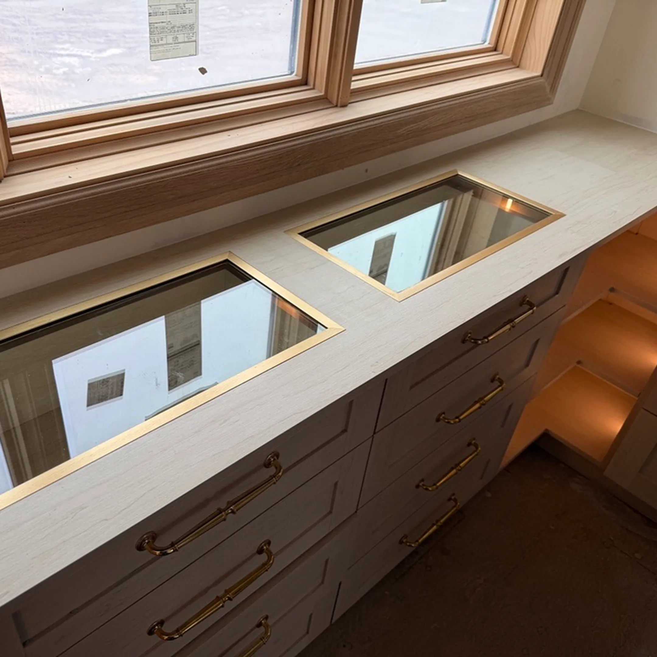 Designer measuring a closet for custom storage installation