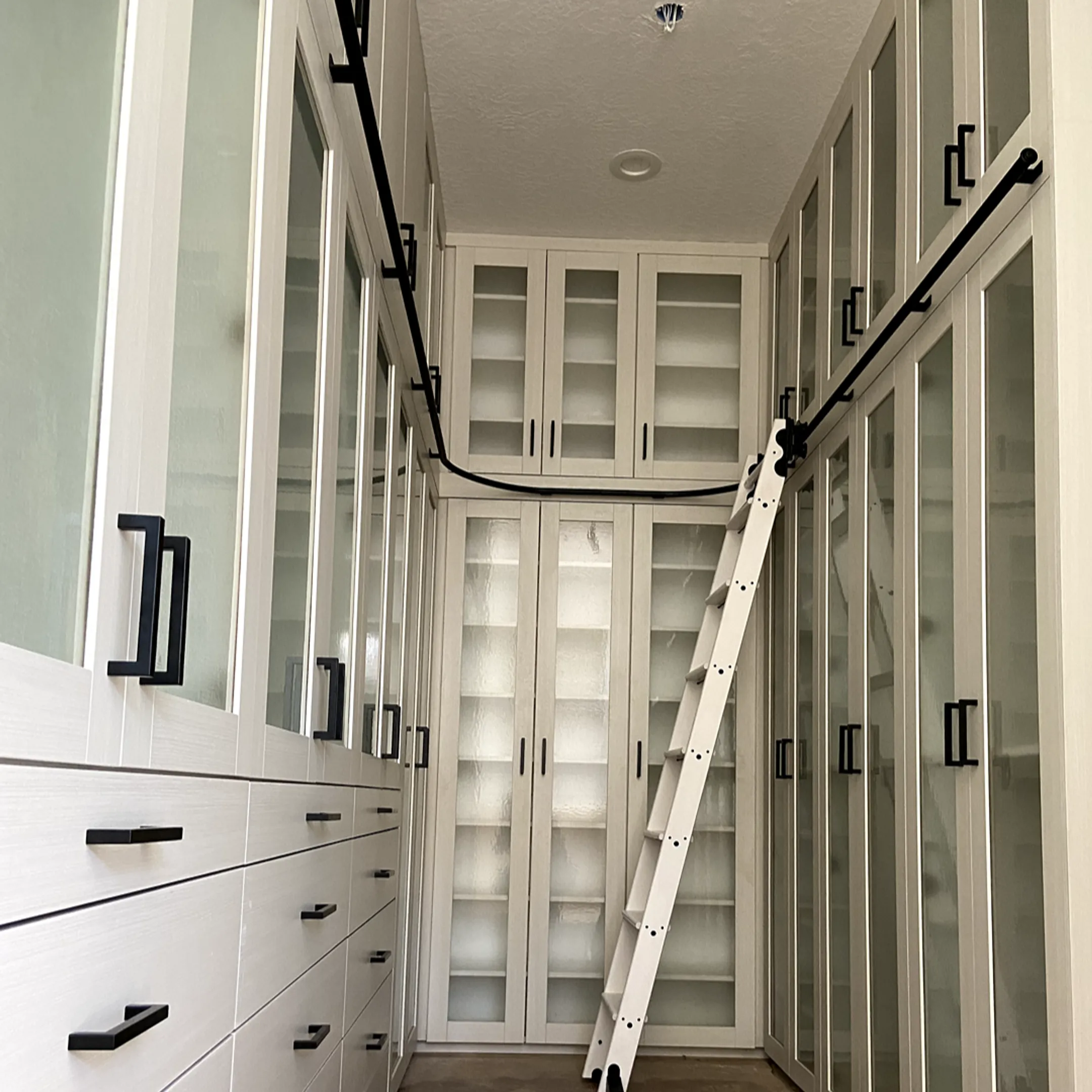 Designer reviewing custom cabinet plans