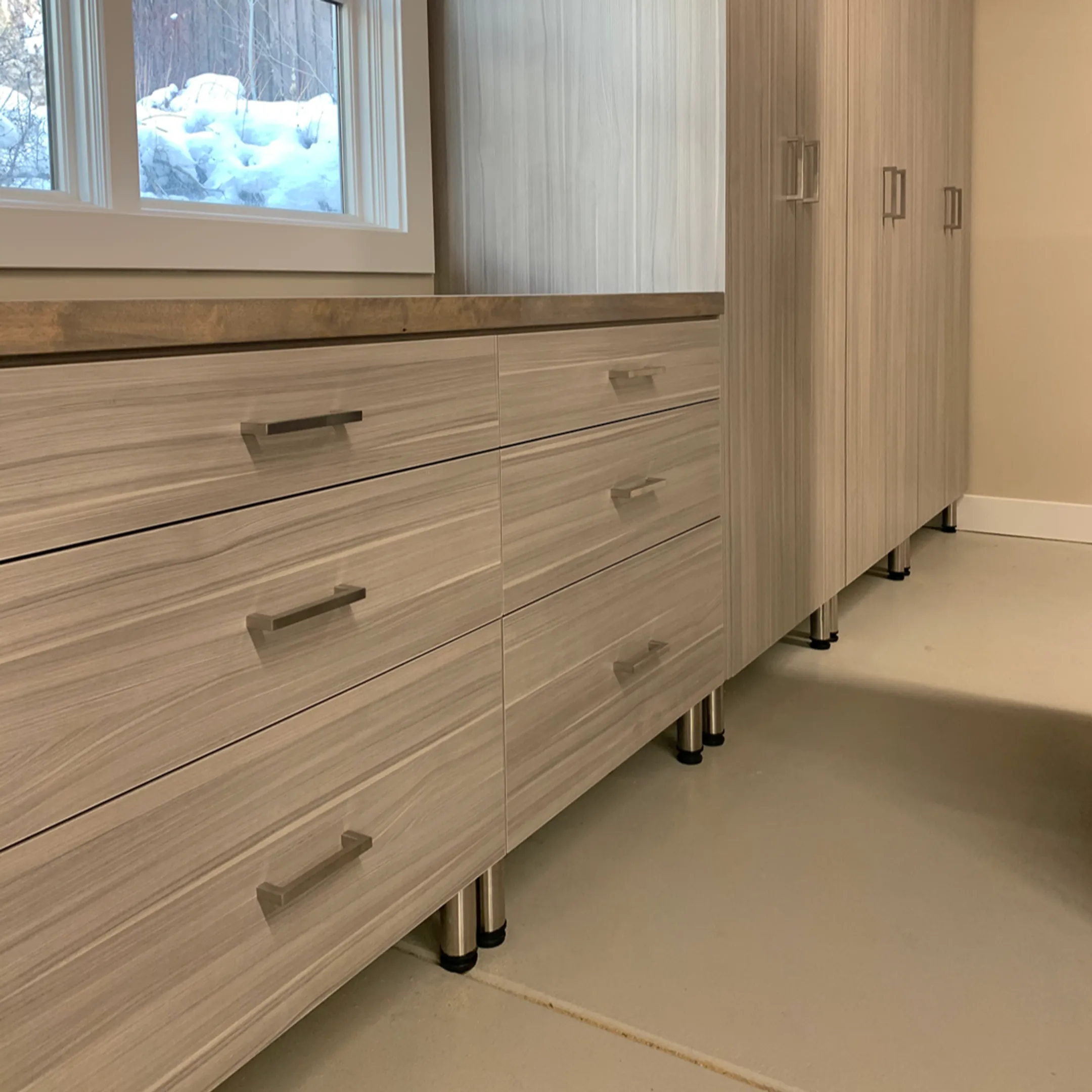 Custom garage cabinets and organized storage system