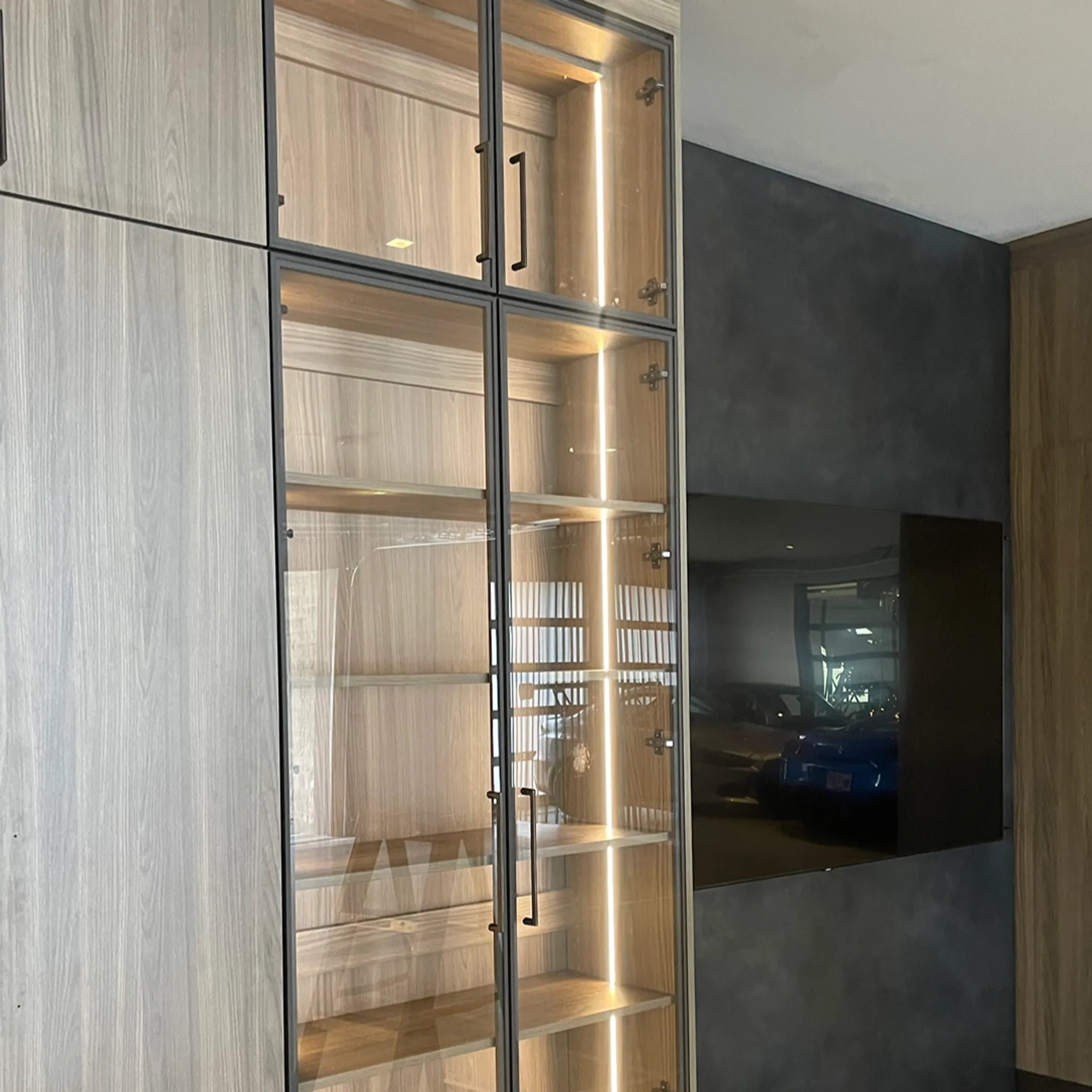 Luxury men’s closet with custom cabinetry
