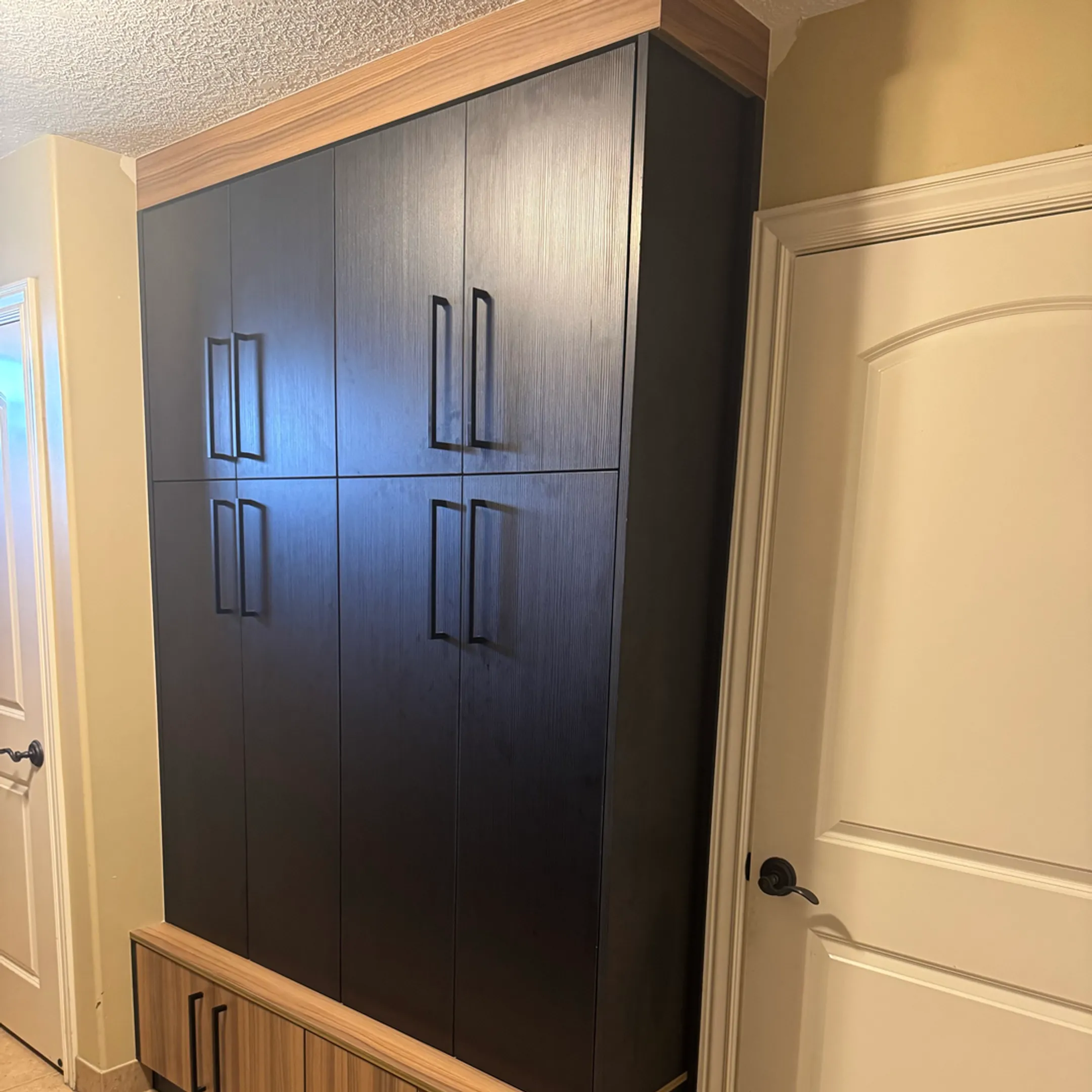 Cabinet installer fitting custom built-in storage