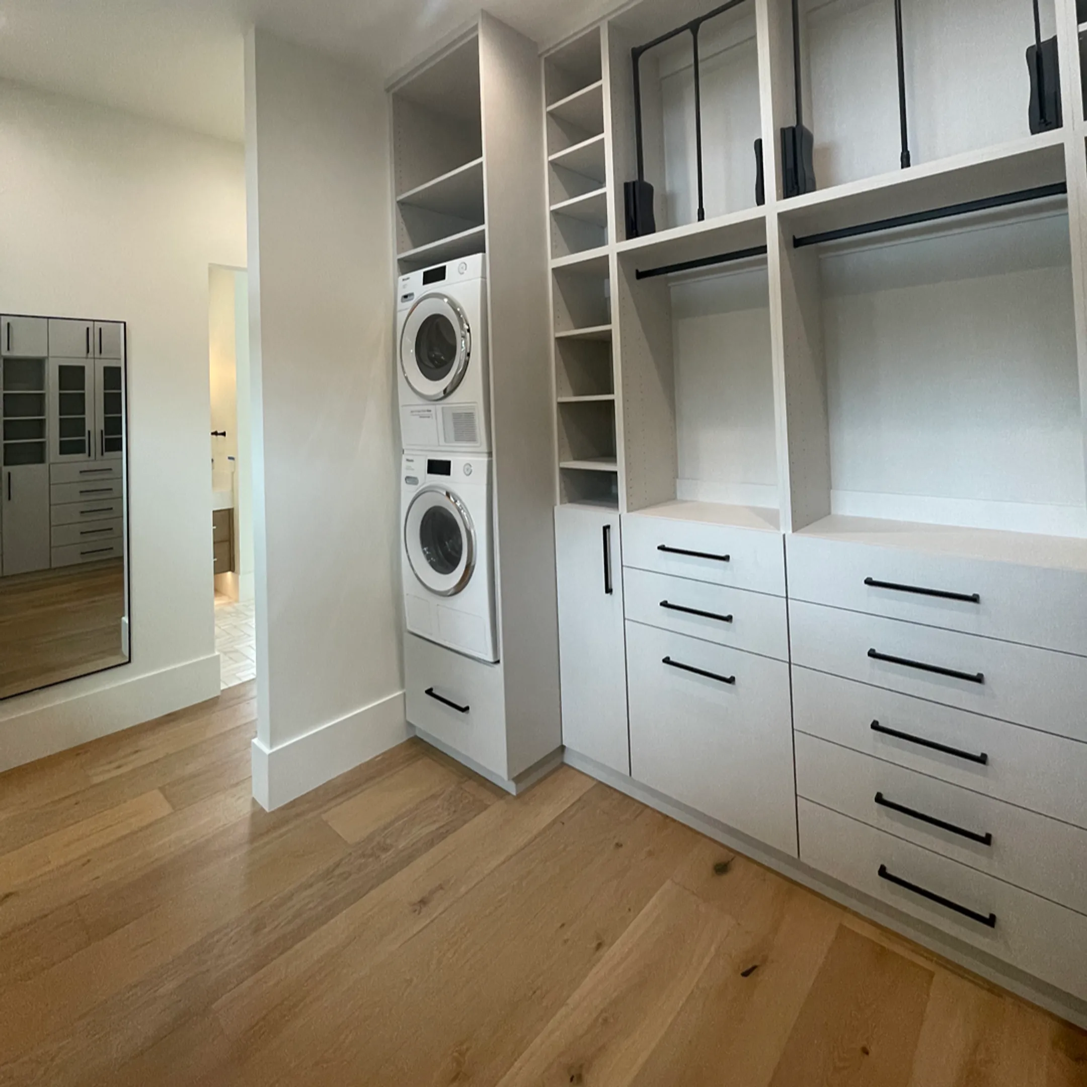 Custom built-in cabinets with organized shelves and drawers