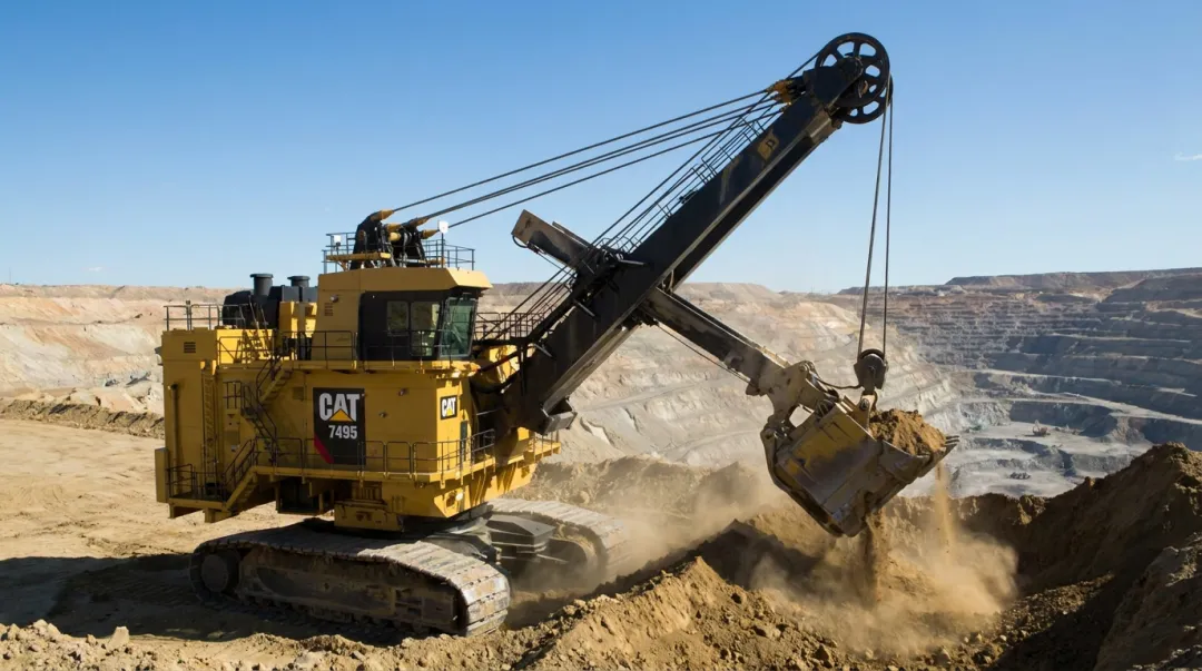 Caterpillar 7495 HR electric rope shovel operating at surface mine site