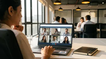 Diverse distributed team members celebrating recognition during virtual video call meeting
