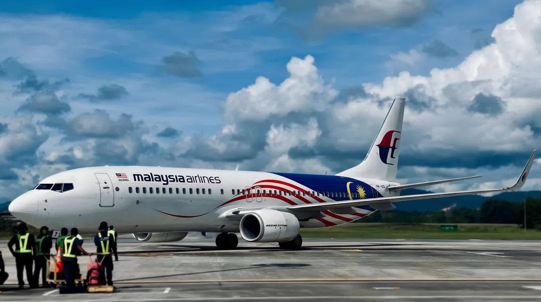 Malaysia Airlines aircraft at airport representing high-trust airline brand rebranding