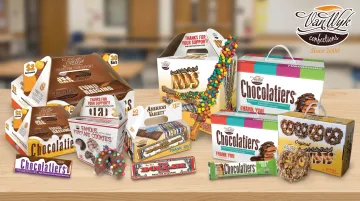 Assortment of Van Wyk fundraising products including chocolate bars and popcorn