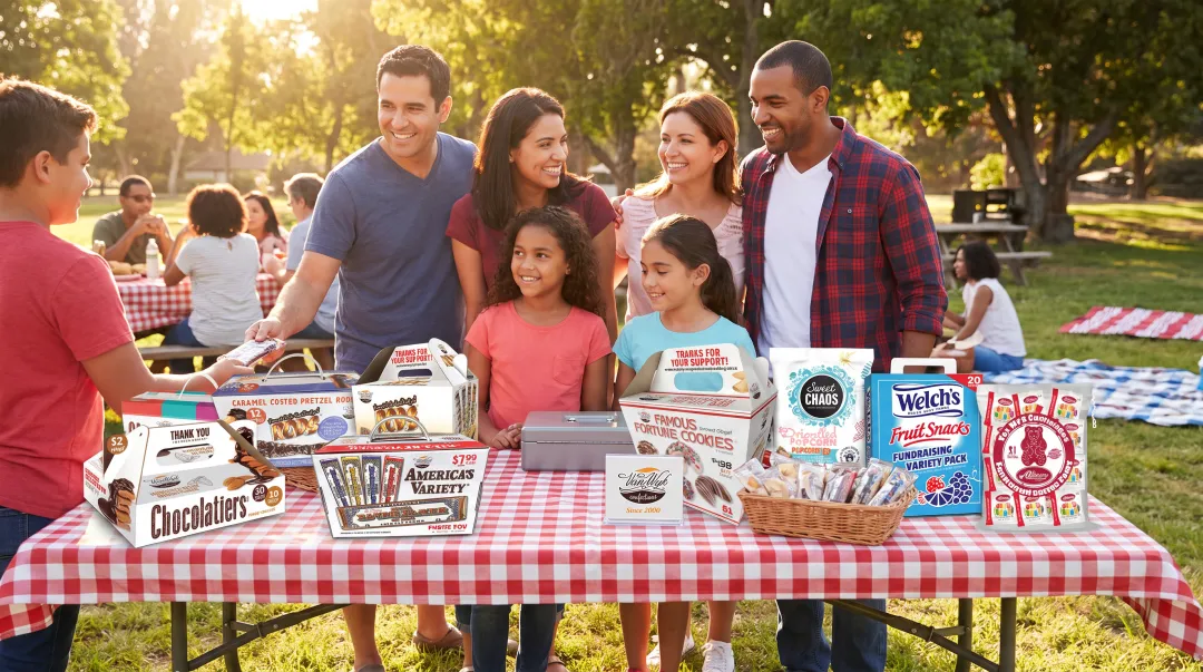 Assorted chocolate bars and snack fundraiser products ready for family reunion sale