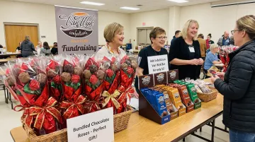 Bundled chocolate roses and chocolate bars display for fundraiser sales table