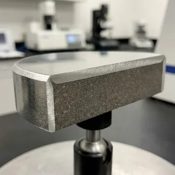 Cross-section of a boronized metal component showing hardened anti-friction coating layer