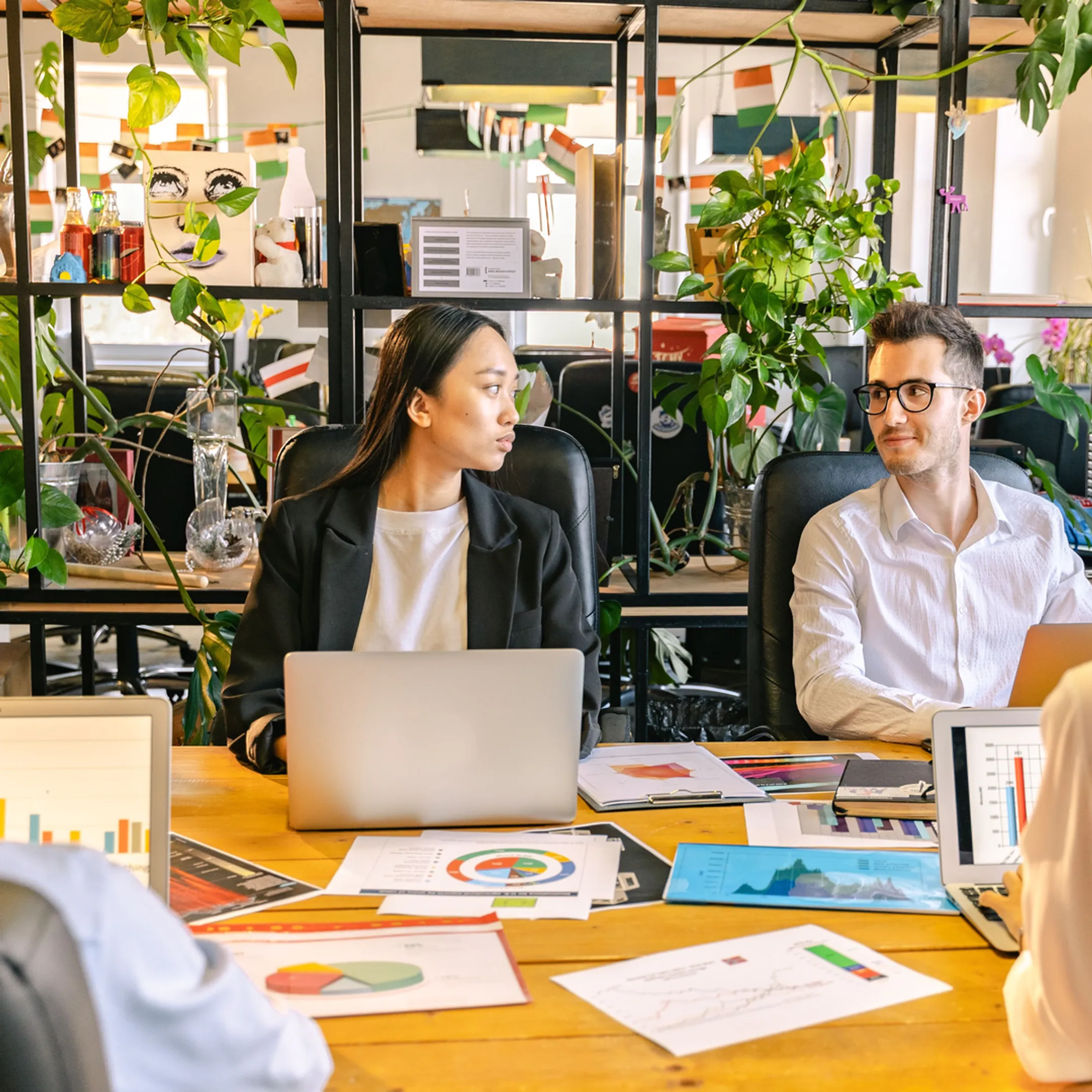 Senior marketing operator reviewing AI-supported campaign work