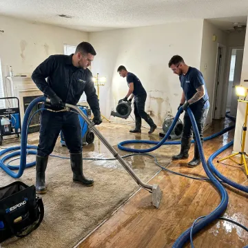 Emergency crew responding to plumbing water damage