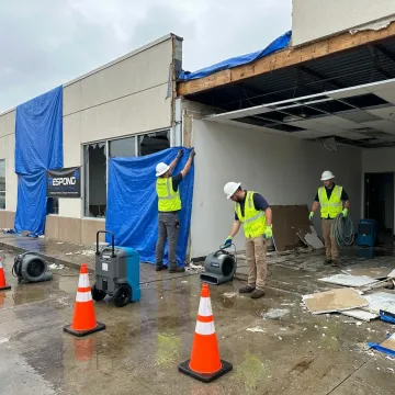 Commercial restoration crew responding after storm damage
