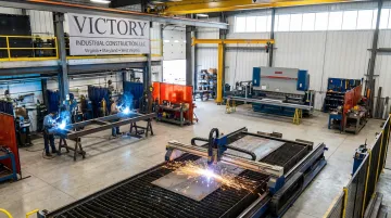 Victory Industrial Construction fabrication shop with CNC cutting and welding equipment