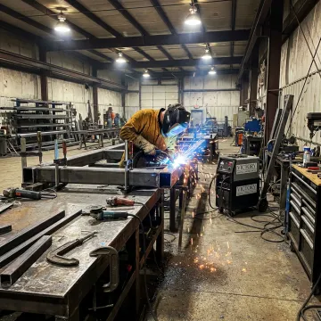Industrial welding and metal fabrication in progress
