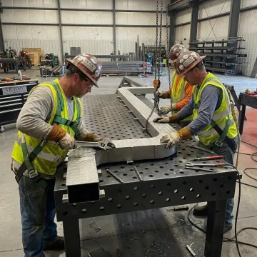 Commercial construction crew installing steel components