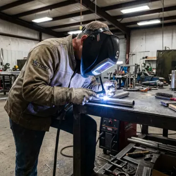 TIG welder creating a clean bead on metal