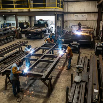 Industrial metal fabrication team working in Virginia shop