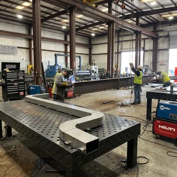 Commercial construction contractors working on a steel facility