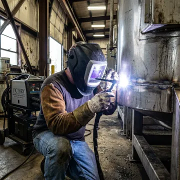 Portable mobile TIG welding at industrial jobsite