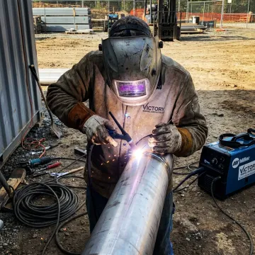 Mobile TIG welding setup at industrial site