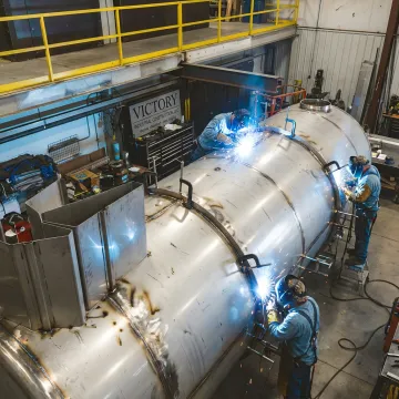 Custom stainless steel tank fabrication in progress