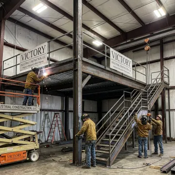 Custom office mezzanine flooring in an industrial facility