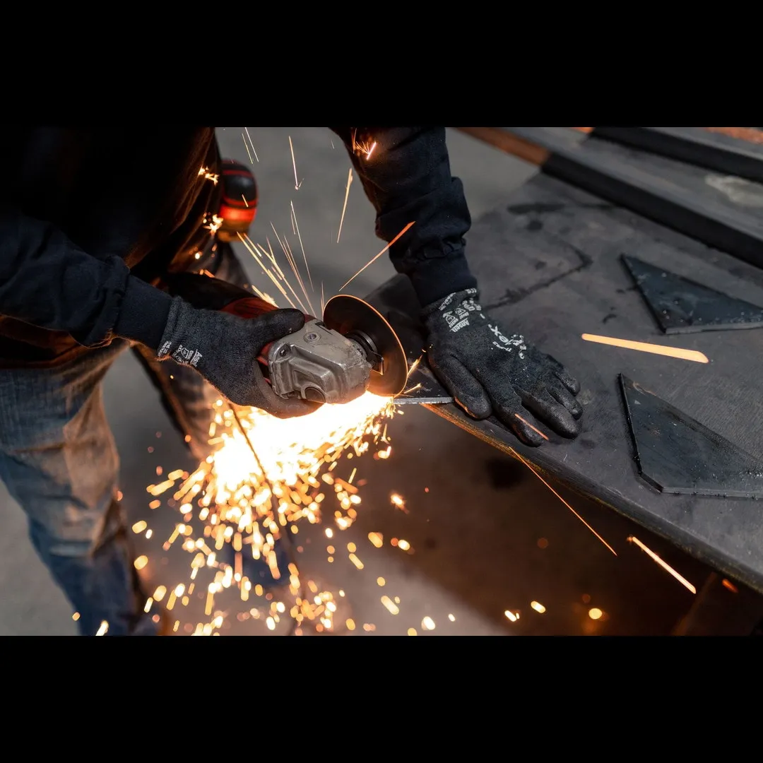 Industrial welder fabricating steel assembly