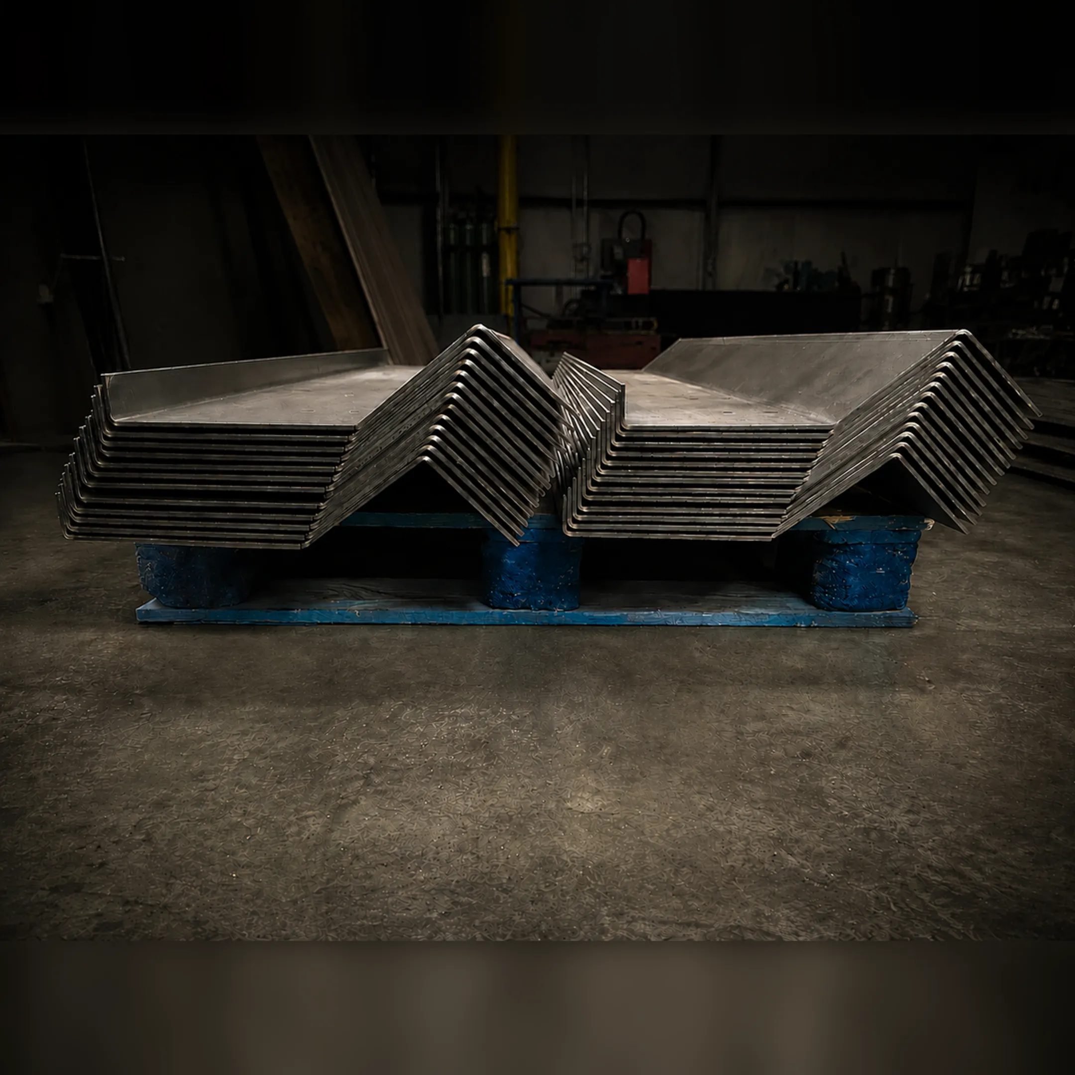 Custom metal fabrication shop with welding and steel parts