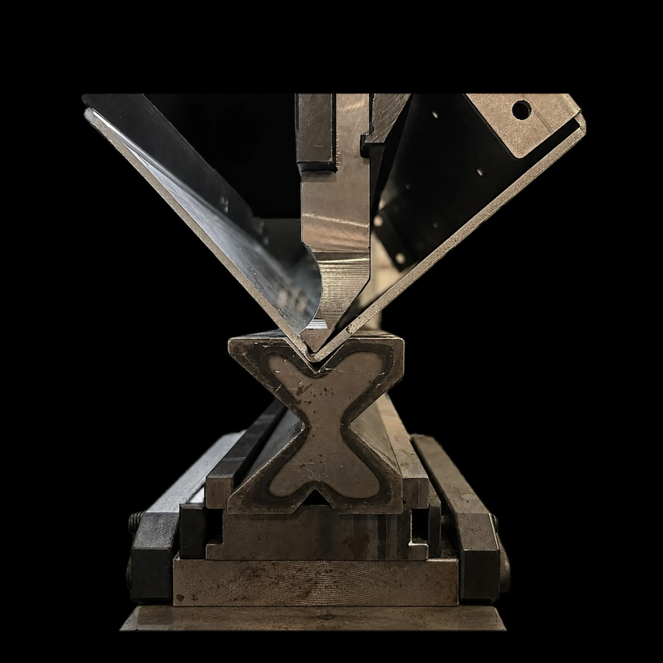 Welder fabricating a steel component