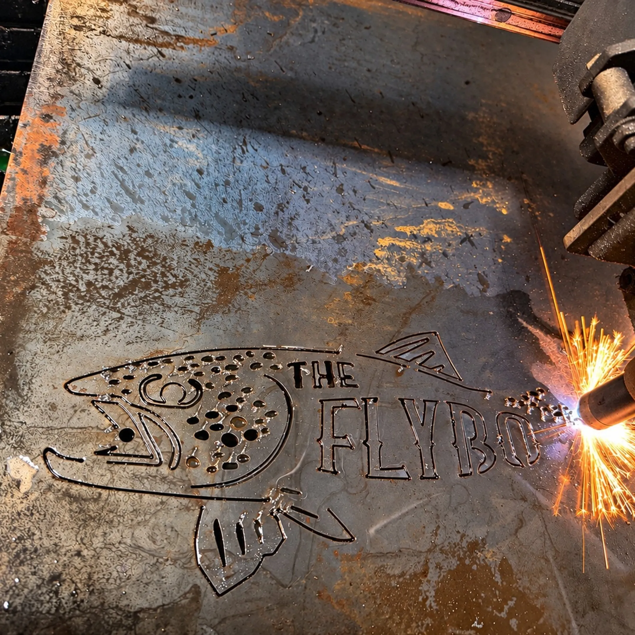 Fabricator reviewing metal fabrication drawings