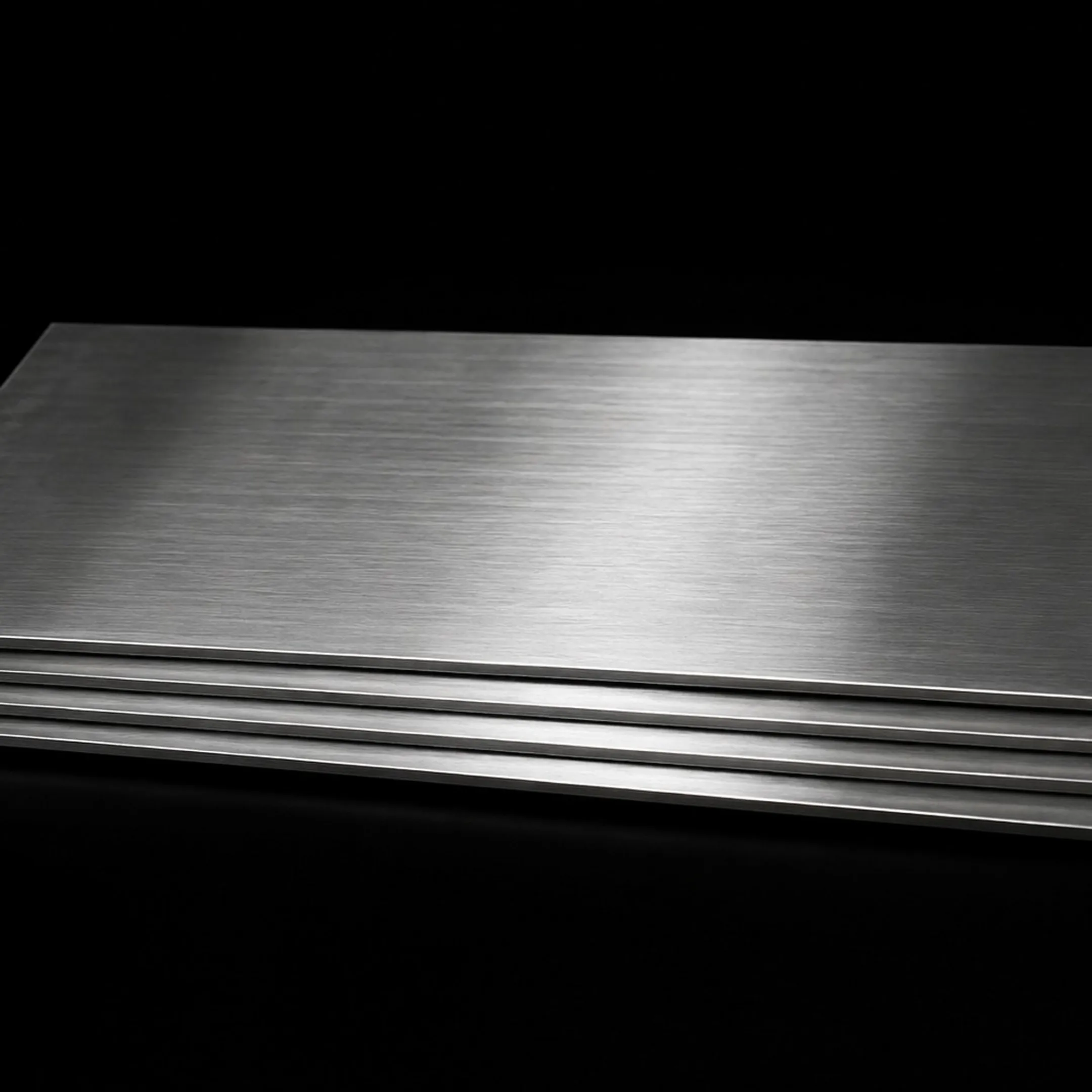 Fabricator reviewing stainless steel drawings before welding
