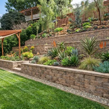 Residential retaining wall in a sloped backyard