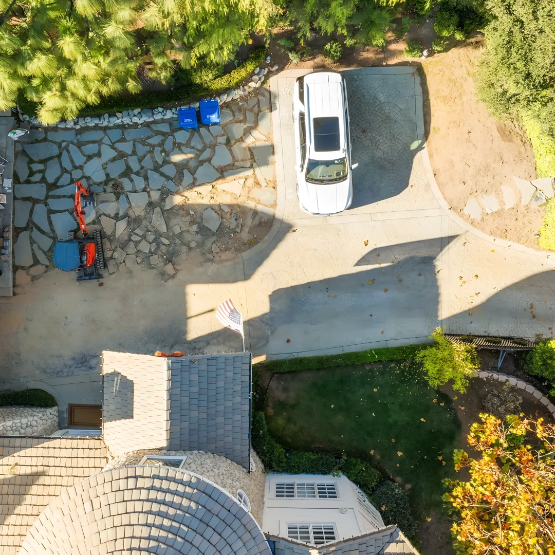 Engineered hillside hardscape patio with retaining walls