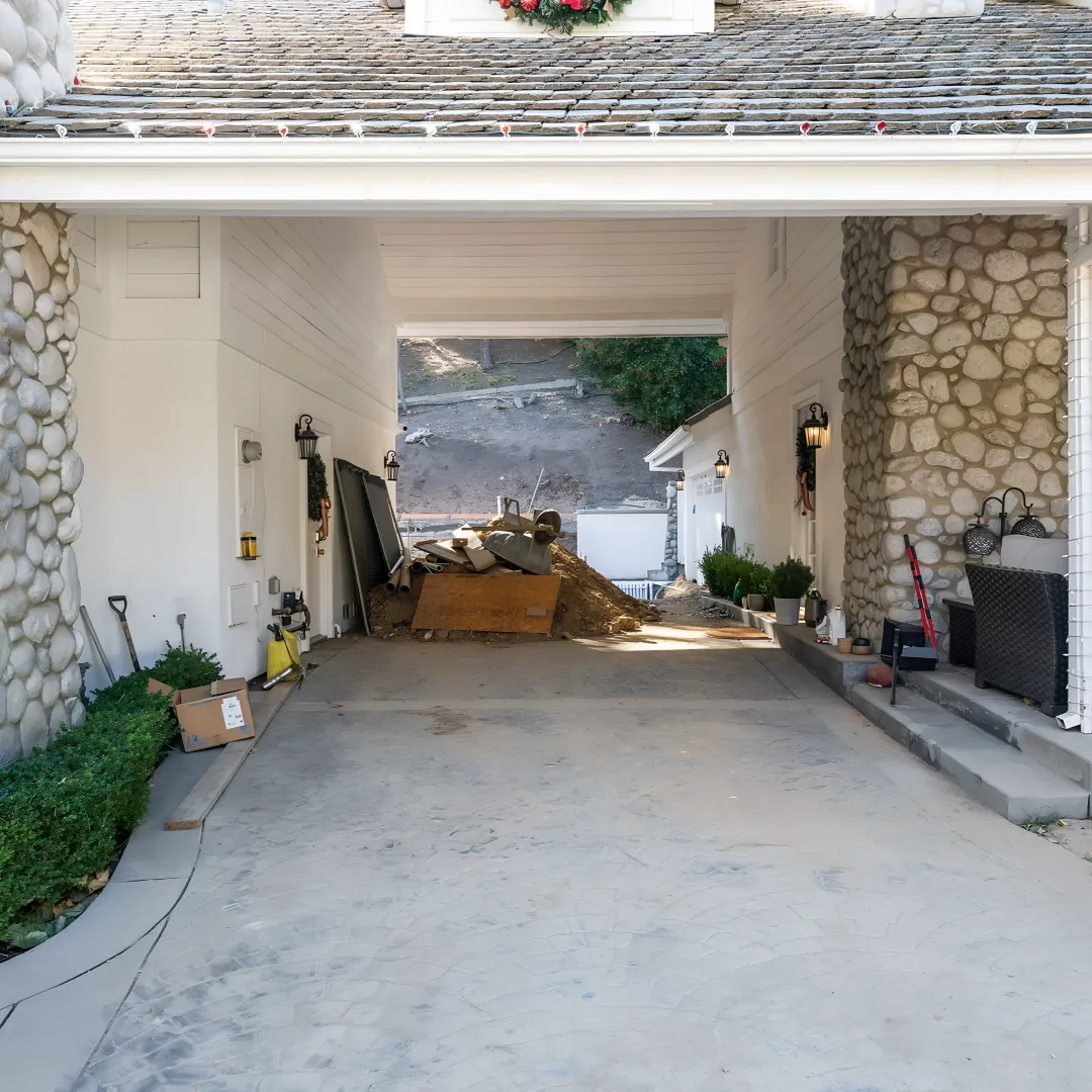 Hardscape contractor reviewing a hillside patio layout