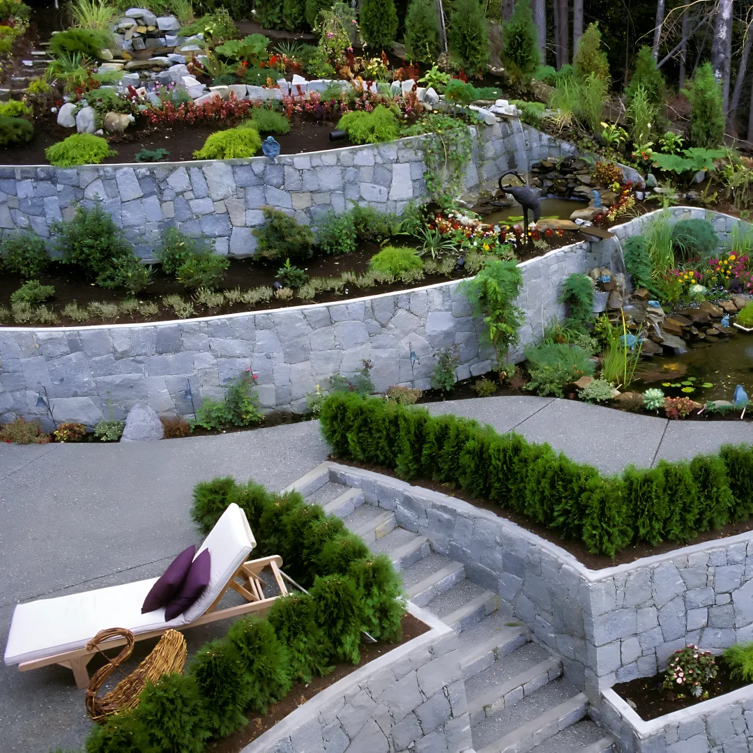 Decorative stone garden wall in a landscaped yard