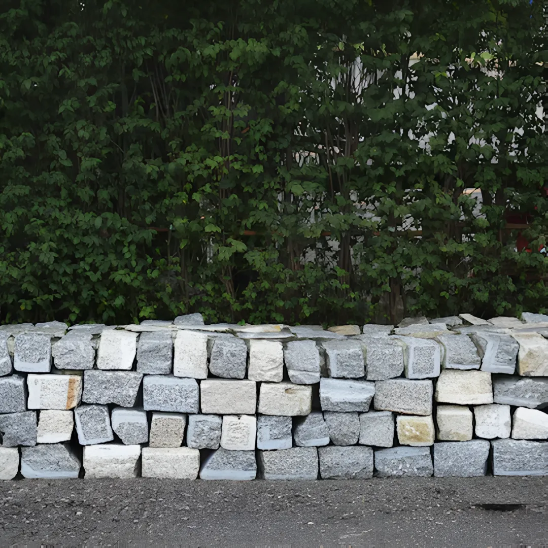 Residential retaining wall in a sloped backyard