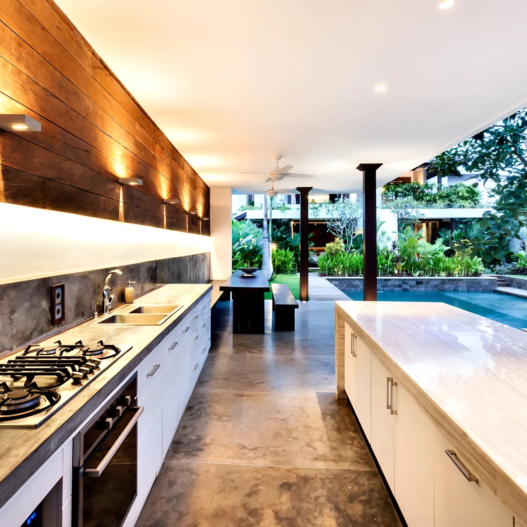 Crew remodeling a hillside outdoor living space