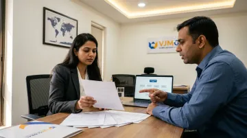 Business adviser and founder reviewing cross-border IP ownership and tax compliance documents