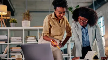 Entrepreneur consulting local business advisor for startup funding support