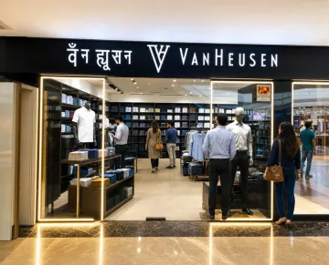 Modern Indian retail storefront with branded signage and shoppers