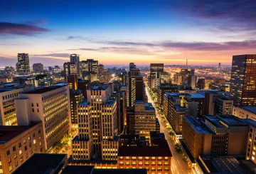 Modern Johannesburg office skyline representing South African business district