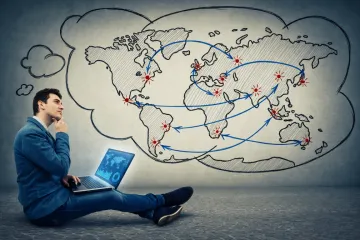 Remote entrepreneur working on laptop managing international business formation