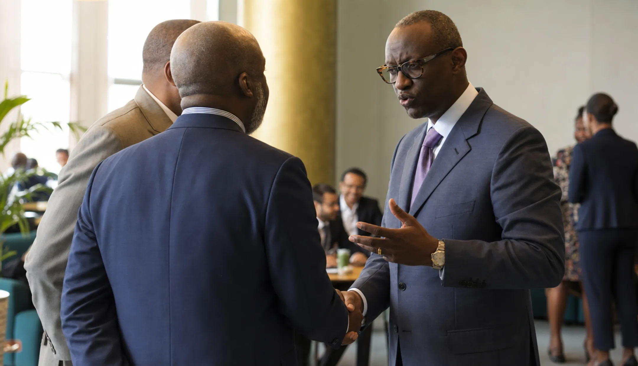 Business professionals networking at a Moroccan trade event or meeting