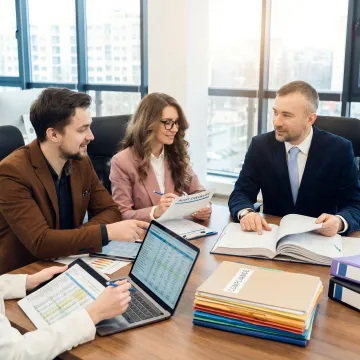 Financial professionals preparing audit documentation