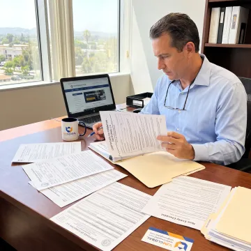 Business owner reviewing company formation documents