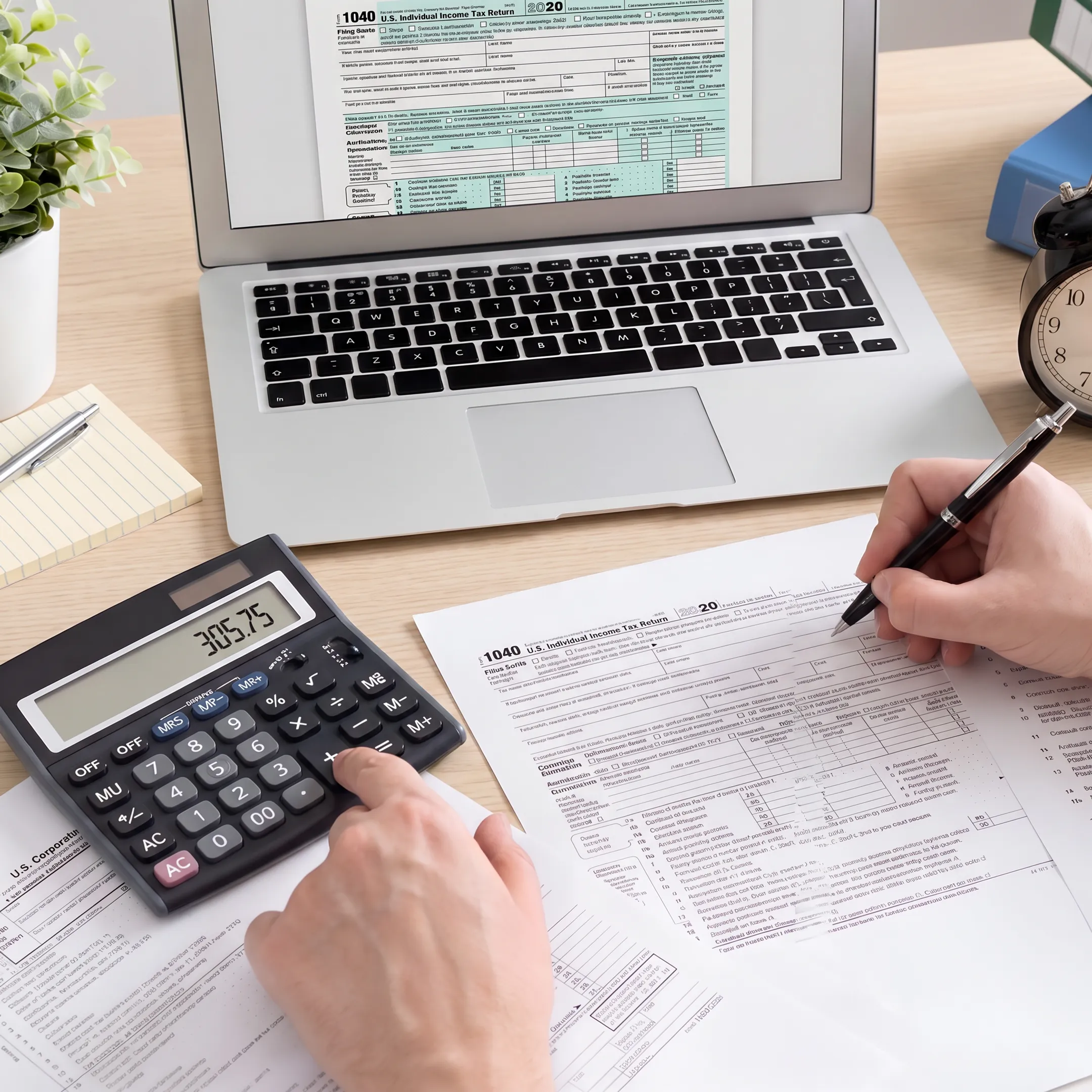 Professional reviewing business tax filing records and expense documentation