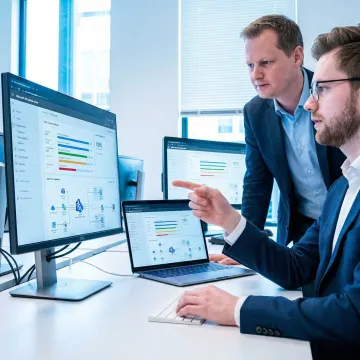 Cloud team executing a structured Microsoft 365 data migration process on multiple screens.
